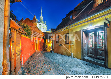 Amazing night view of historic town Sighisoara and Clock Tower built by Saxons. Amazing night view of historic town Sighisoara and Clock Tower built by Saxons. 114975691
