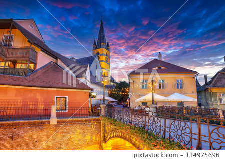 Amazing View of Evangelical Cathedral and the Liars Bridge in the center of Sibiu city. Amazing View of Evangelical Cathedral and the Liars Bridge in the center of Sibiu city. 114975696