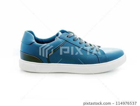 blue sneakers isolated on white background. Colored sneakers close-up 114976537