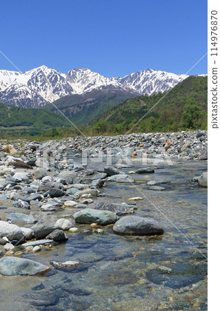 May in Hakuba: Snow-covered Northern Alps seen from the foot of the mountain 114976870