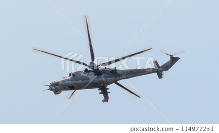 Mi-24 Hind attack helicopter overhead 114977231