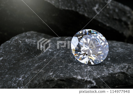 diamond on black coal background diamond on black coal background 114977948