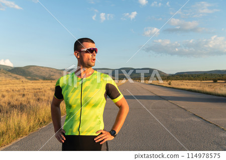 Triathlete resting after exhausting training for the upcoming marathon. 114978575