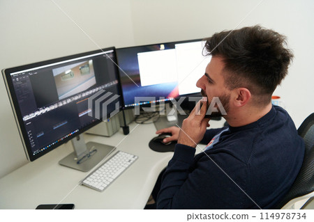 professional video editor enhancing digital footage using specialized software 114978734