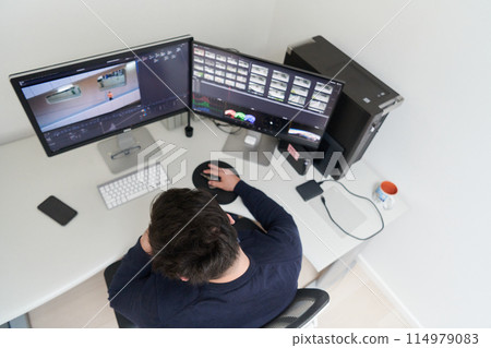 professional video editor enhancing digital footage using specialized software 114979083
