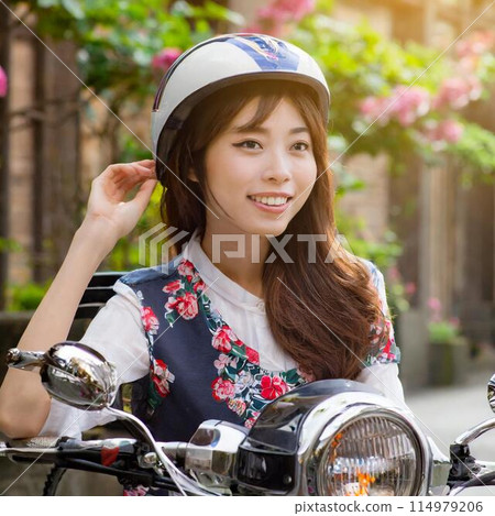 Cute woman riding a bike 114979206