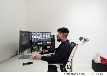 professional video editor enhancing digital footage using specialized software 114979303
