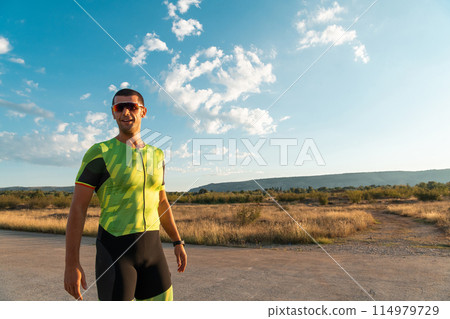 A triathlete resting after a hard morning's run. Training preparation for the upcoming marathon 114979729