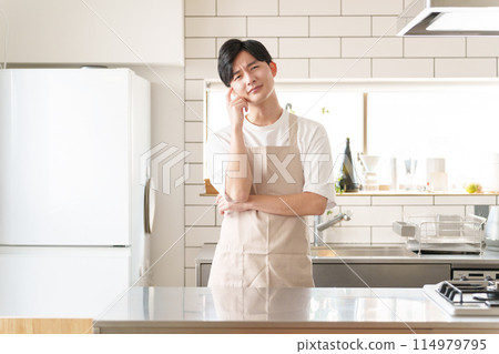 Man thinking in the kitchen Man thinking in the kitchen 114979795