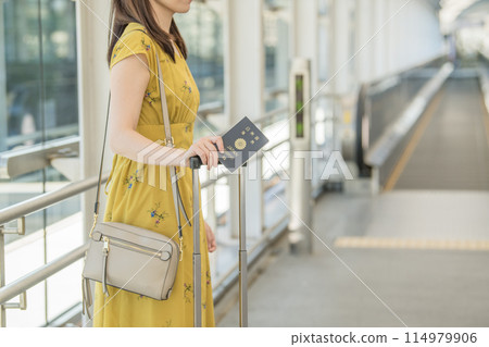 Travel passport woman 114979906