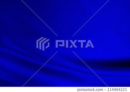 Blue flowing silk satin background 114984221