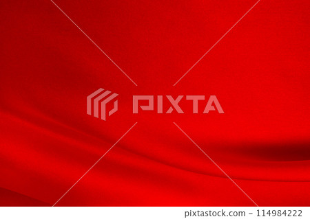 Deep red flowing silk satin background 114984222