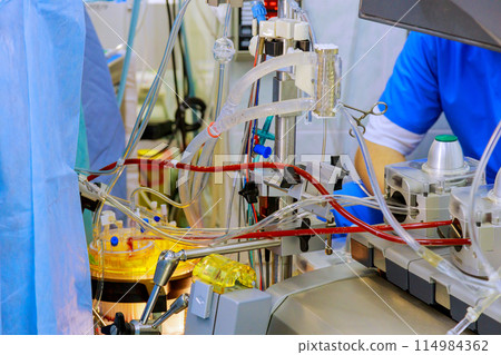 During doctor performing surgery used surgical equipment, anesthesia machine in operating room 114984362