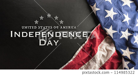 Happy Independence day concept made from American flag on dark wooden background. 114985322