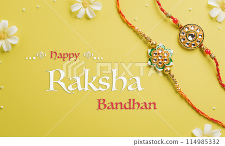Raksha Bandhan, Indian festival with beautiful Rakhi and Rice Grains on yellow background. A traditional Indian wrist band which is a symbol of love between Sisters and Brothers Raksha Bandhan, Indian festival with beautiful Rakhi and Rice Grains on yellow background. A traditional Indian wrist band which is a symbol of love between Sisters and Brothers 114985332