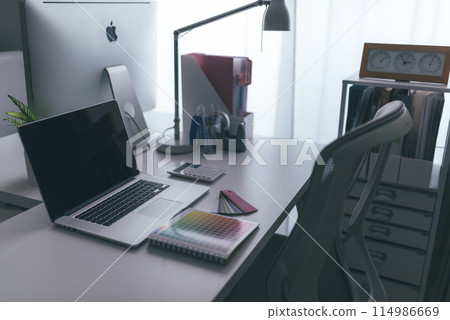 Desk with a computer 114986669
