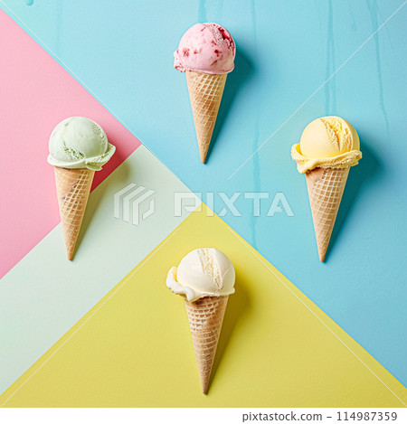 Scoops of ice cream in a waffle cone on a colorful background 114987359