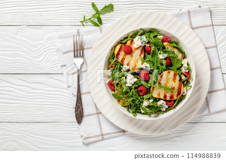 grilled pear salad with cheese, arugula, berries grilled pear salad with cheese, arugula, berries 114988839