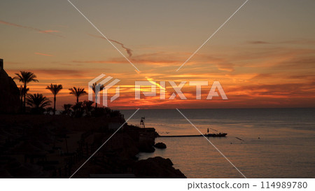 Sea coastline at dawn. Sea coastline at dawn. 114989780