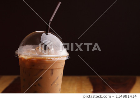 ice espresso on wood floor 114991414