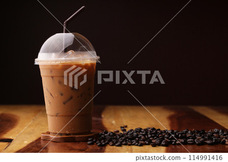 ice espresso on wood floor 114991416