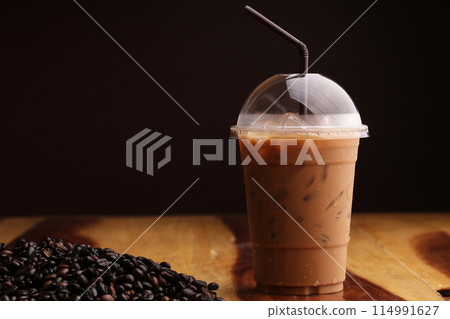 ice espresso on wood floor 114991627