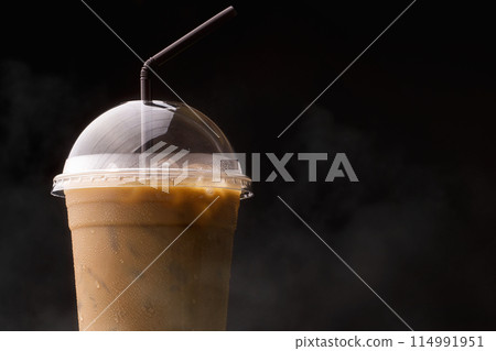 ice espresso on wood floor 114991951