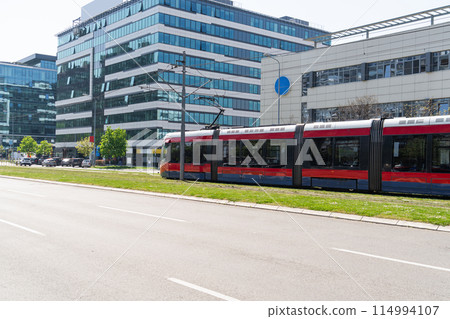 Modern tram on the city street Modern tram on the city street 114994107
