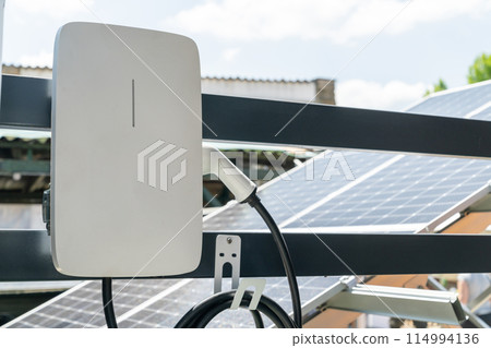 Electric vehicles charging station that takes energy from solar panels. Close up.. 114994136
