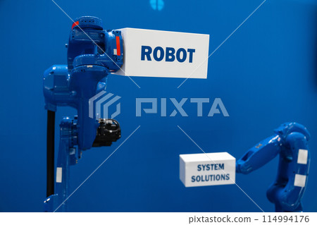 Robot arms on a blue background. Smart industry concept.. 114994176