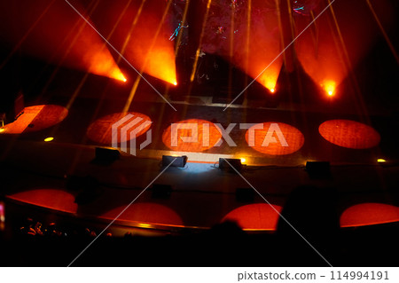 Concert show stage with red spotlights,backlight,music,musicians to perform 114994191