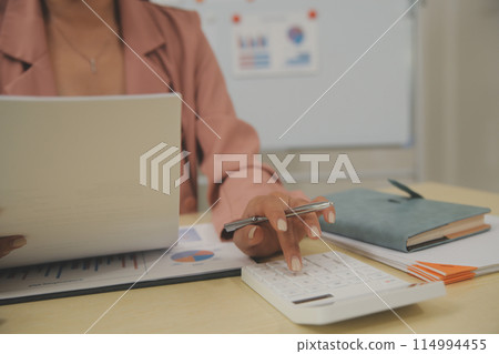 Business Documents, Auditor businesswoman checking searching document legal prepare paperwork or report for analysis TAX time,accountant Documents data contract partner deal in workplace office 114994455