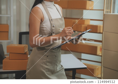 Portrait of young business asian woman online working in office desk use computer copyspace. Success business people employee, freelance SME online marketing work at home, coworking space concept Portrait of young business asian woman online working in office desk use computer copyspace. Success business people employee, freelance SME online marketing work at home, coworking space concept 114994512