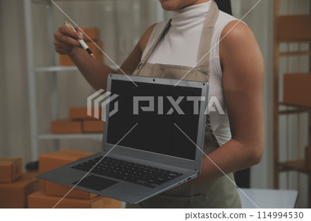 Portrait of young business asian woman online working in office desk use computer copyspace. Success business people employee, freelance SME online marketing work at home, coworking space concept Portrait of young business asian woman online working in office desk use computer copyspace. Success business people employee, freelance SME online marketing work at home, coworking space concept 114994530