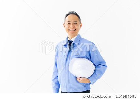Man in work clothes, helmet 114994593