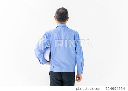 Man in work clothes, helmet, back view 114994634