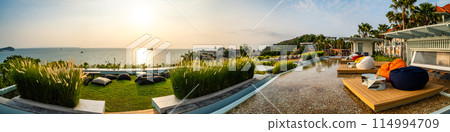 View of rooftop bar at sunset in Cape Panwa beach in Phuket, Thailand 114994709
