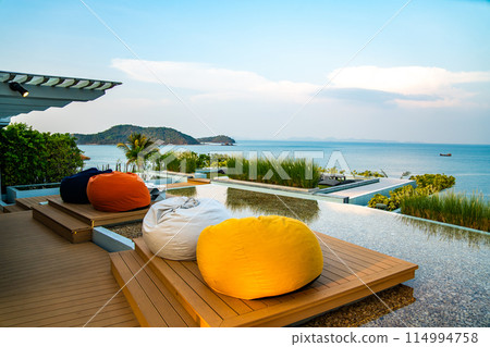View of rooftop bar at sunset in Cape Panwa beach in Phuket, Thailand 114994758