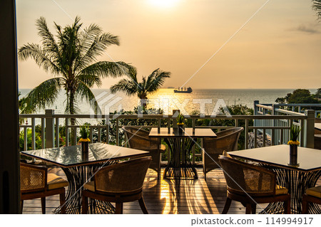 View of rooftop bar at sunset in Cape Panwa beach in Phuket, Thailand View of rooftop bar at sunset in Cape Panwa beach in Phuket, Thailand 114994917