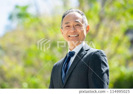 Middle-aged man business portrait Middle-aged man business portrait 114995025