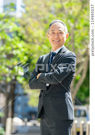 Middle-aged man business portrait vertical 114995037