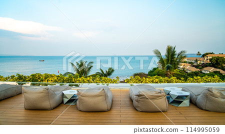 View of rooftop bar at sunset in Cape Panwa beach in Phuket, Thailand 114995059
