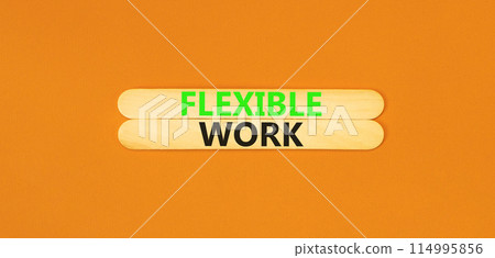 Flexible work symbol. Concept words Flexible work on beautiful wooden stick. Beautiful orange paper background. Business Flexible work concept. Copy space. Flexible work symbol. Concept words Flexible work on beautiful wooden stick. Beautiful orange paper background. Business Flexible work concept. Copy space. 114995856