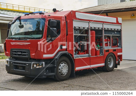 A state-of-the-art firetruck, equipped with advanced rescue technology, stands ready with its skilled firefighting team, prepared to intervene and respond rapidly to emergencies, ensuring the safety A state-of-the-art firetruck, equipped with advanced rescue technology, stands ready with its skilled firefighting team, prepared to intervene and respond rapidly to emergencies, ensuring the safety 115000264