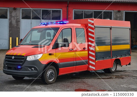 A state-of-the-art firetruck, equipped with advanced rescue technology, stands ready with its skilled firefighting team, prepared to intervene and respond rapidly to emergencies, ensuring the safety A state-of-the-art firetruck, equipped with advanced rescue technology, stands ready with its skilled firefighting team, prepared to intervene and respond rapidly to emergencies, ensuring the safety 115000330