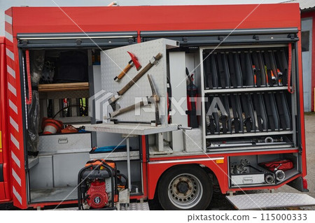Close-up of essential firefighting equipment on a modern firetruck, showcasing tools and gear ready for emergency response to hazardous fire situations 115000333