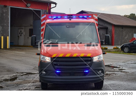 A state-of-the-art firetruck, equipped with advanced rescue technology, stands ready with its skilled firefighting team, prepared to intervene and respond rapidly to emergencies, ensuring the safety A state-of-the-art firetruck, equipped with advanced rescue technology, stands ready with its skilled firefighting team, prepared to intervene and respond rapidly to emergencies, ensuring the safety 115000360