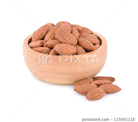 Almond in bowl isolated on white background Almond in bowl isolated on white background 115002118