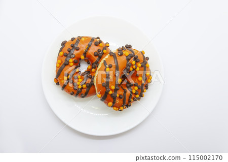 Sweet glazed donuts with sprinkles and chocolate, Delicious sweet food on white background. 115002170