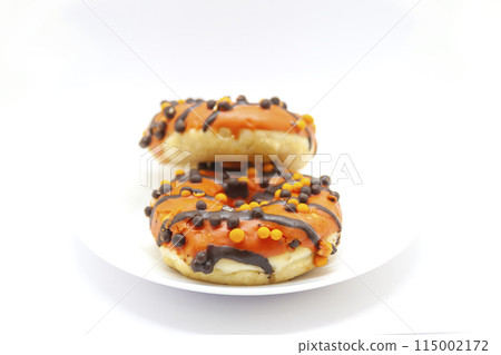 Sweet glazed donuts with sprinkles and chocolate, Delicious sweet food on white background. Sweet glazed donuts with sprinkles and chocolate, Delicious sweet food on white background. 115002172